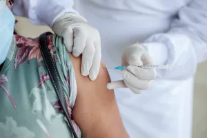 Image of a person receiving a flu vaccination